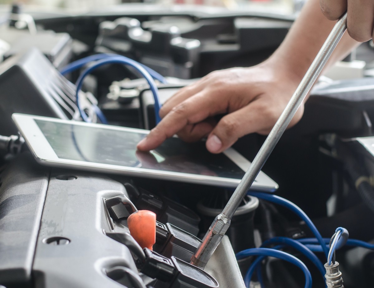 Diagnostic Tablet on engine transmission sensor